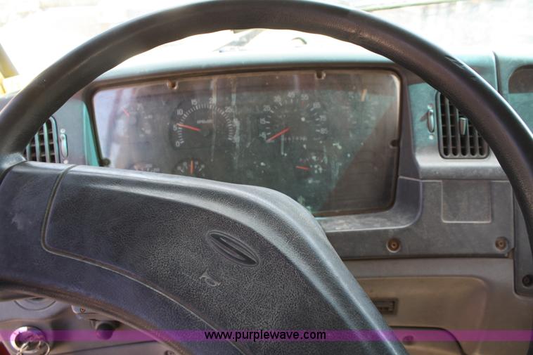 image for item A3236 1998 Ford Louisville LT9513 boom truck