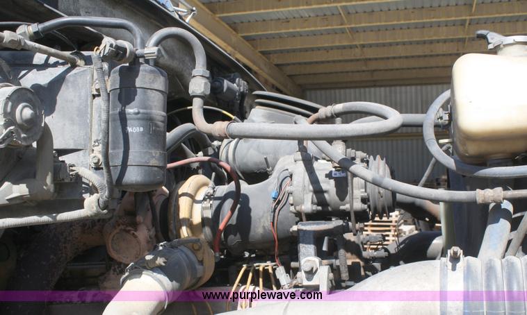 image for item A3236 1998 Ford Louisville LT9513 boom truck