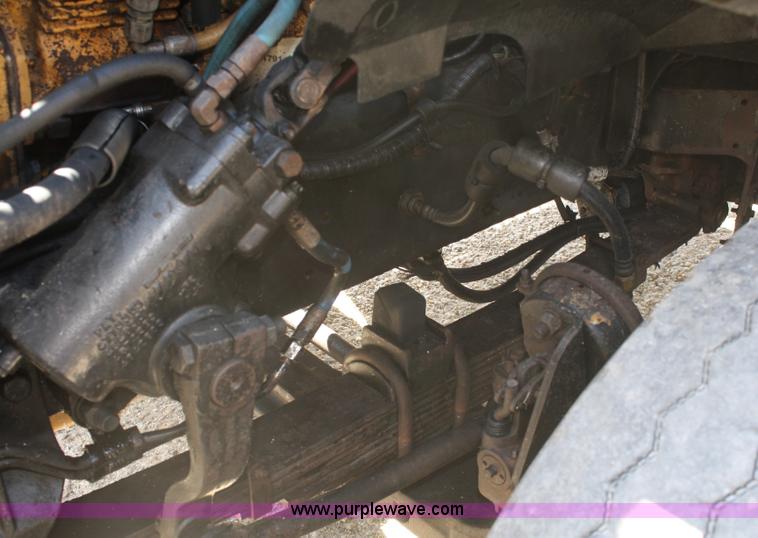 image for item A3236 1998 Ford Louisville LT9513 boom truck