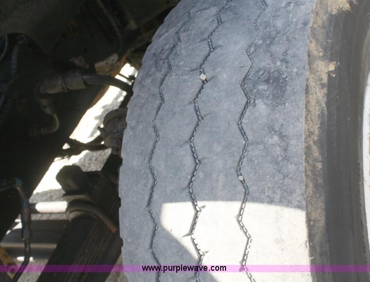 image for item A3236 1998 Ford Louisville LT9513 boom truck