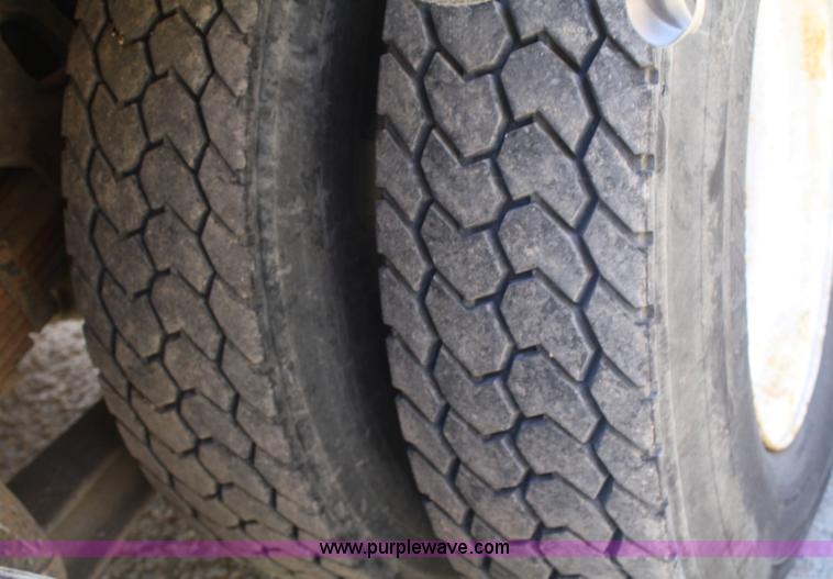 image for item A3236 1998 Ford Louisville LT9513 boom truck