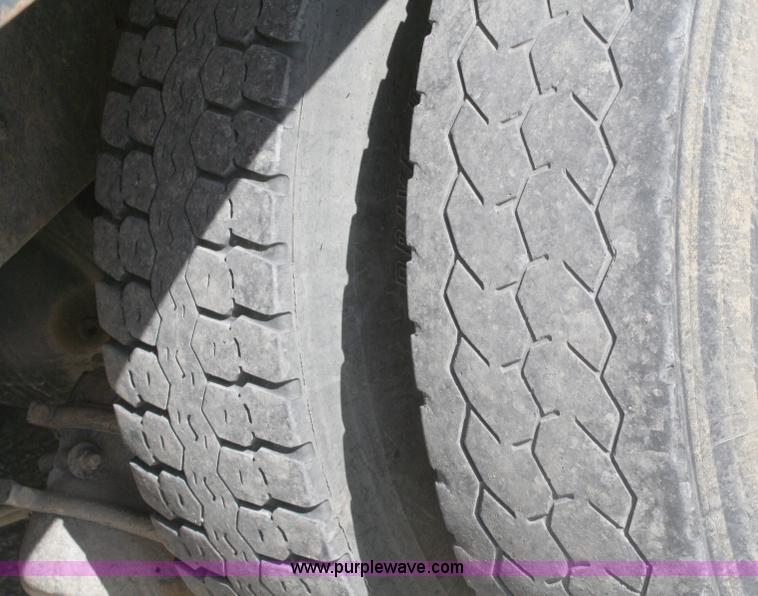 image for item A3236 1998 Ford Louisville LT9513 boom truck