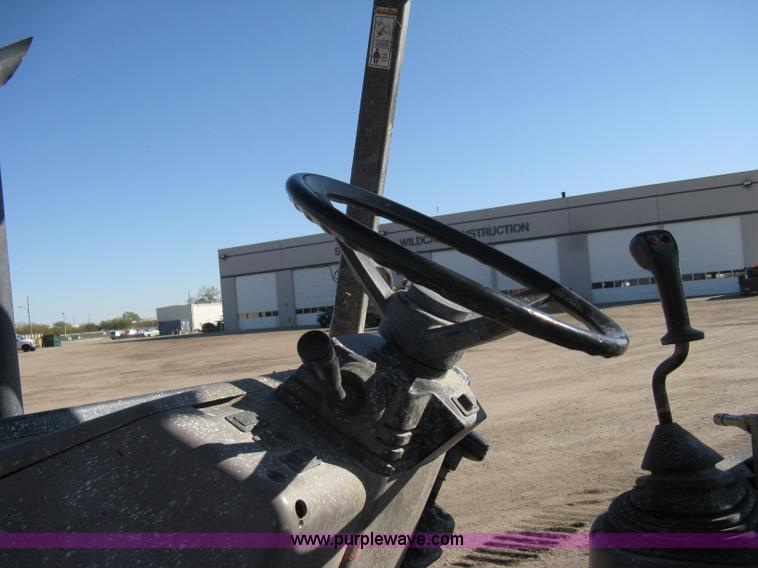 image for item A4404 2002 Case 570MXT FWA loader/landscape tractor