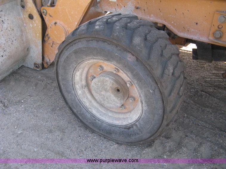 image for item A4404 2002 Case 570MXT FWA loader/landscape tractor