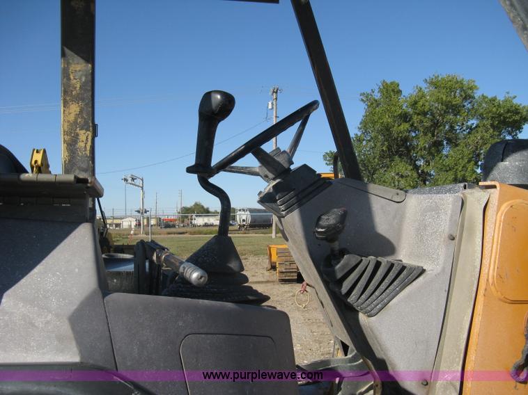 image for item A4404 2002 Case 570MXT FWA loader/landscape tractor