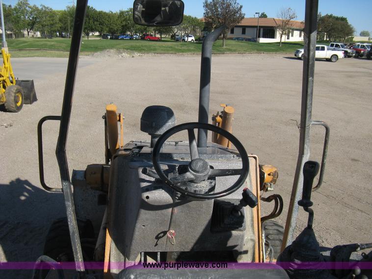 image for item A4404 2002 Case 570MXT FWA loader/landscape tractor