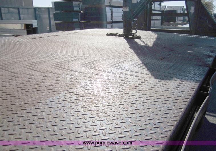 image for item A4414 2001 Sterling M6500 Acterra flatbed semi truck