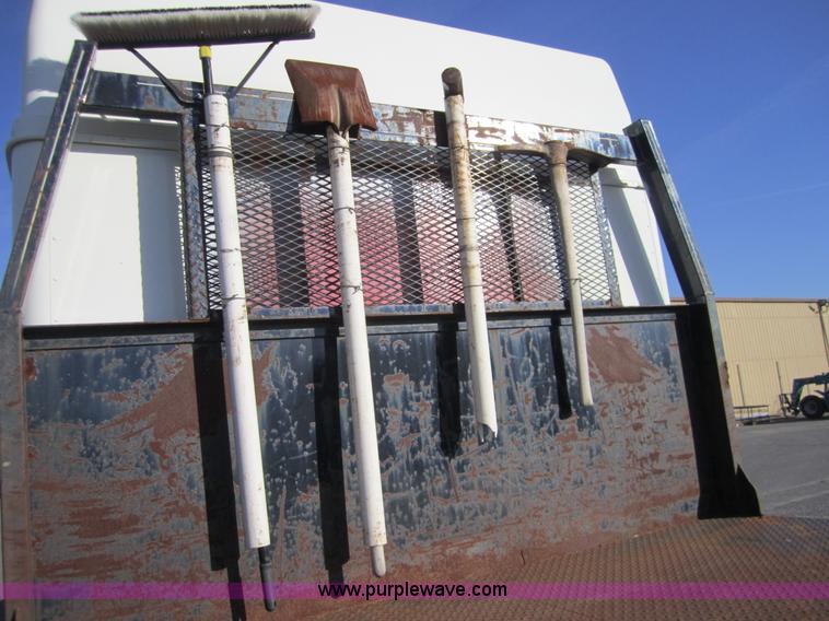 image for item A4414 2001 Sterling M6500 Acterra flatbed semi truck