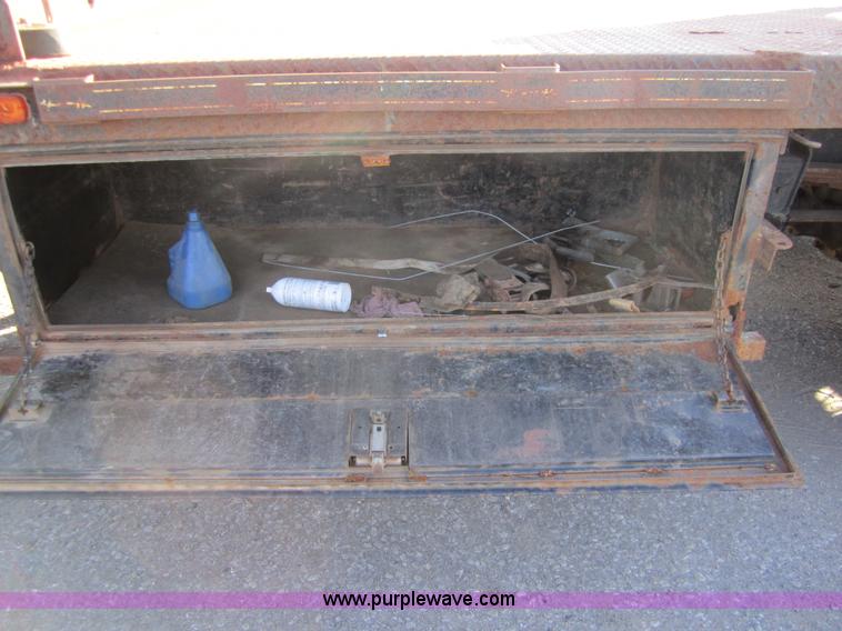 image for item A4414 2001 Sterling M6500 Acterra flatbed semi truck