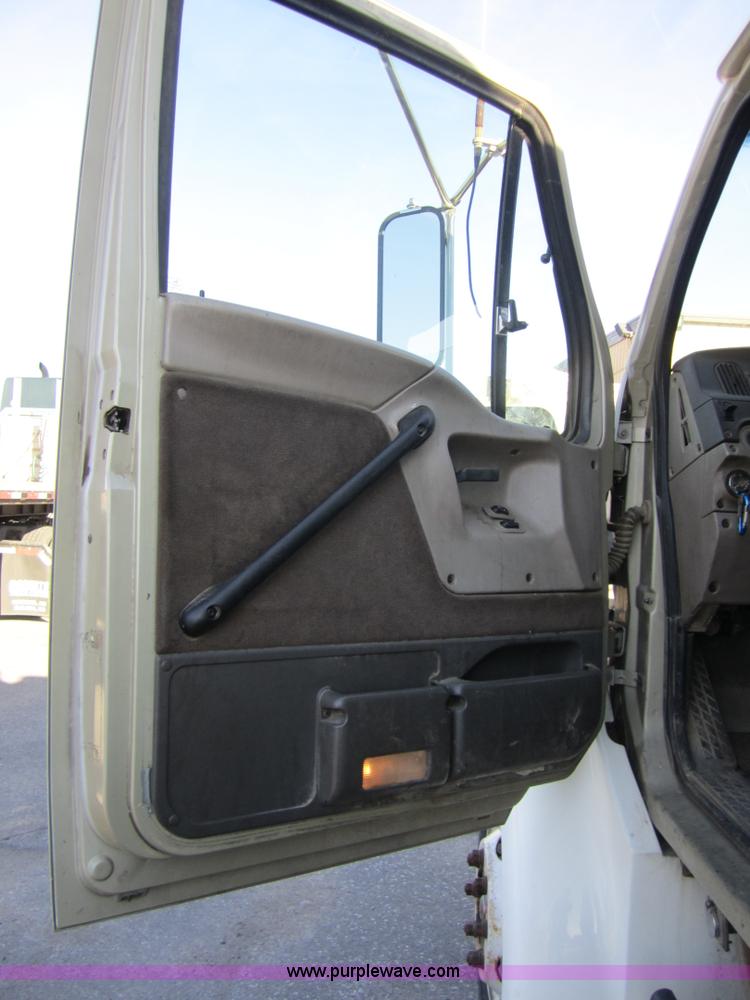 image for item A4414 2001 Sterling M6500 Acterra flatbed semi truck