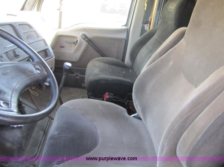 image for item A4414 2001 Sterling M6500 Acterra flatbed semi truck