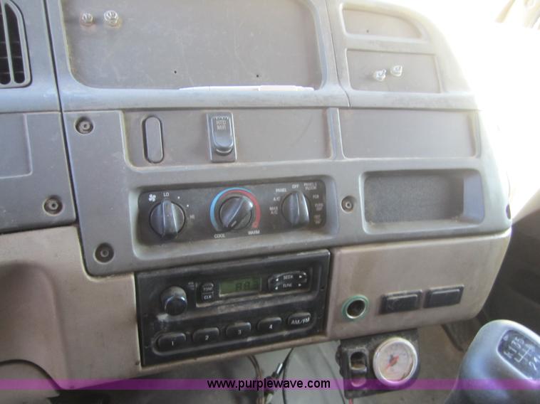 image for item A4414 2001 Sterling M6500 Acterra flatbed semi truck