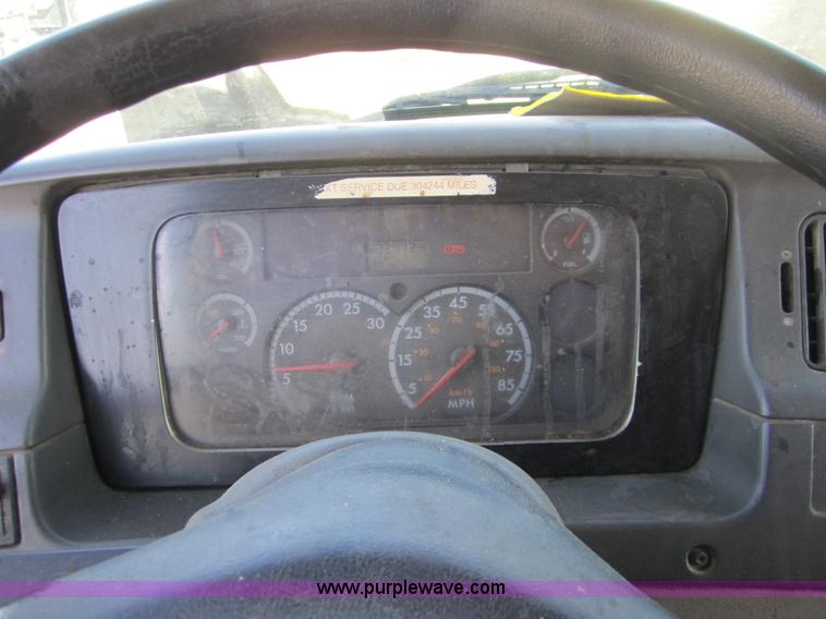 image for item A4414 2001 Sterling M6500 Acterra flatbed semi truck