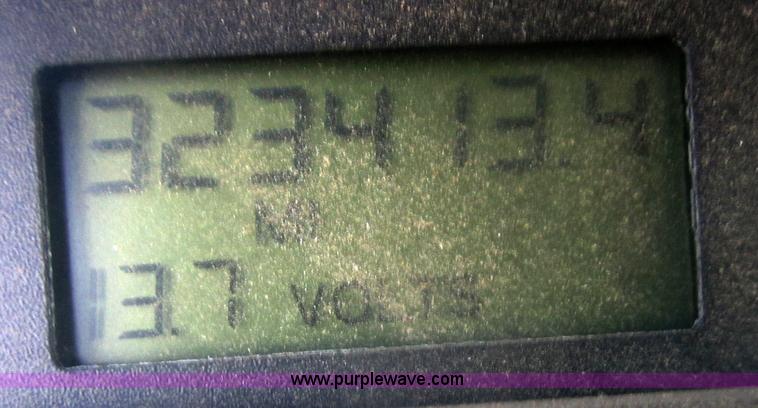 image for item A4414 2001 Sterling M6500 Acterra flatbed semi truck