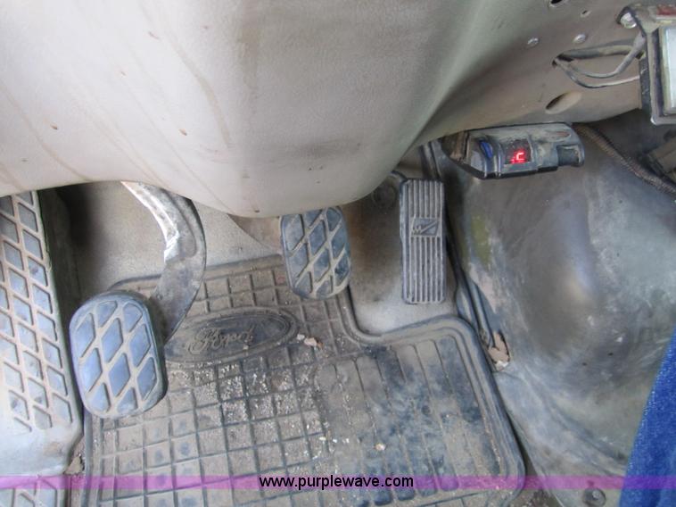 image for item A4414 2001 Sterling M6500 Acterra flatbed semi truck