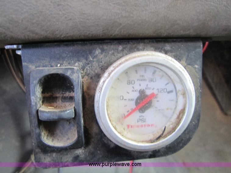 image for item A4414 2001 Sterling M6500 Acterra flatbed semi truck