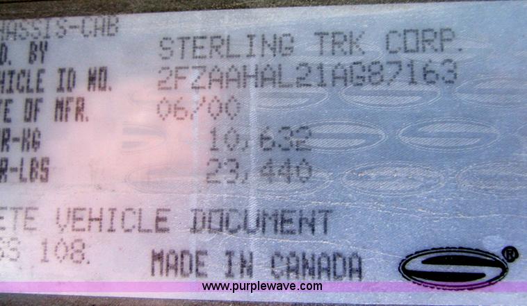 image for item A4414 2001 Sterling M6500 Acterra flatbed semi truck