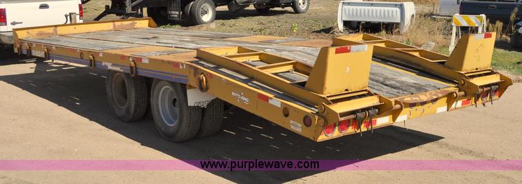 image for item A5696 2004 Eager Beaver tandem axle flatbed trailer