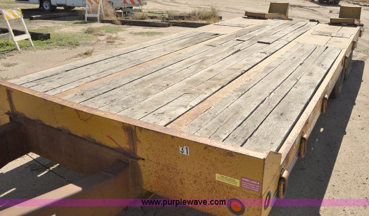 image for item A5696 2004 Eager Beaver tandem axle flatbed trailer