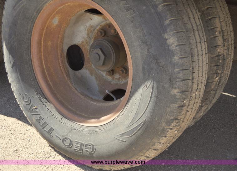 image for item A5696 2004 Eager Beaver tandem axle flatbed trailer