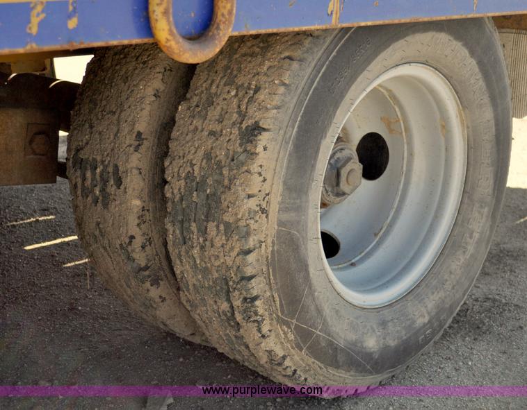 image for item A5696 2004 Eager Beaver tandem axle flatbed trailer