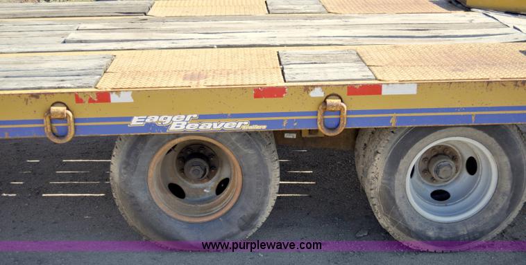 image for item A5696 2004 Eager Beaver tandem axle flatbed trailer