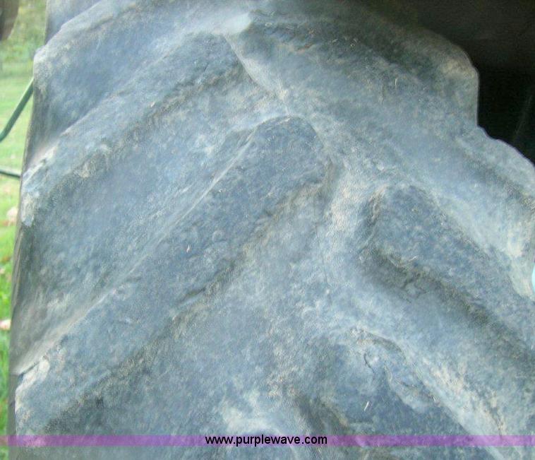 image for item A1495 2002 Kubota M120 MFWD tractor with loader