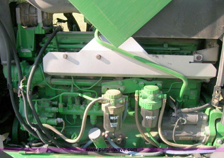 image for item A1496 2005 John Deere 7320 MFWD tractor