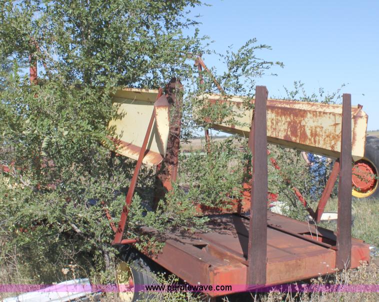 image for item B8521 New Holland 1010 small square bale stack wagon