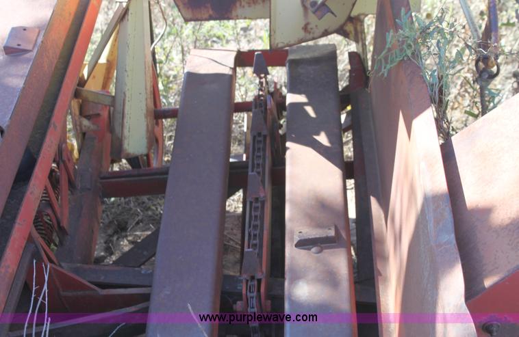 image for item B8521 New Holland 1010 small square bale stack wagon