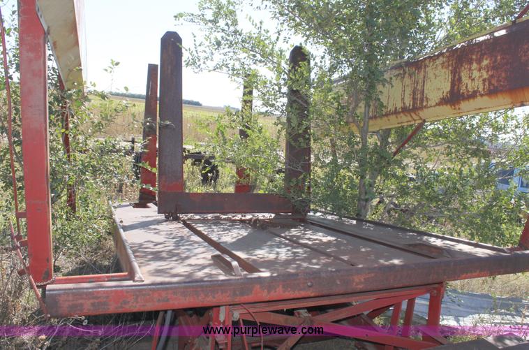 image for item B8521 New Holland 1010 small square bale stack wagon