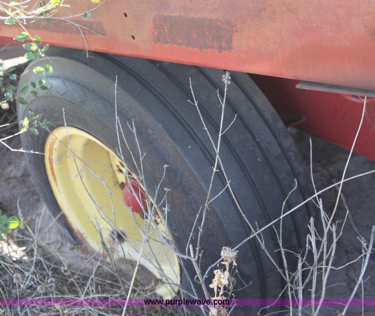 image for item B8521 New Holland 1010 small square bale stack wagon