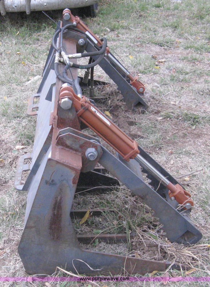 image for item A6004 Shop built fork bucket with hydraulic grapple thumbs