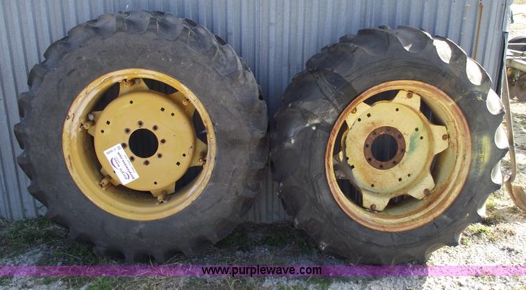 image for item C5689 (2) 13.6-28 tractor tires and wheels