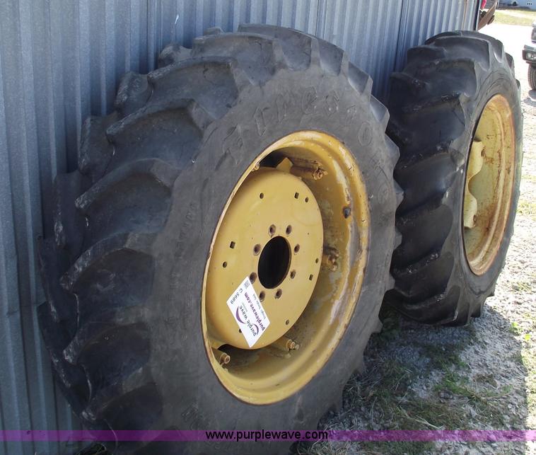 image for item C5689 (2) 13.6-28 tractor tires and wheels