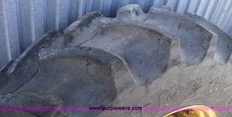 image for item C5689 (2) 13.6-28 tractor tires and wheels