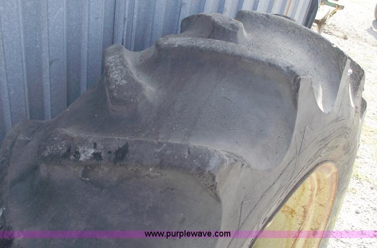 image for item C5689 (2) 13.6-28 tractor tires and wheels