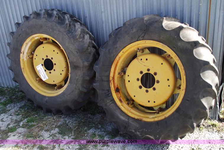 image for item C5689 (2) 13.6-28 tractor tires and wheels