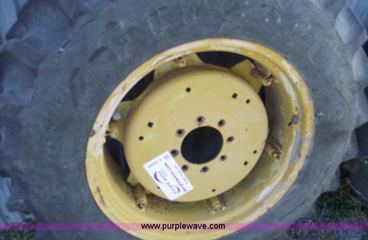 image for item C5689 (2) 13.6-28 tractor tires and wheels