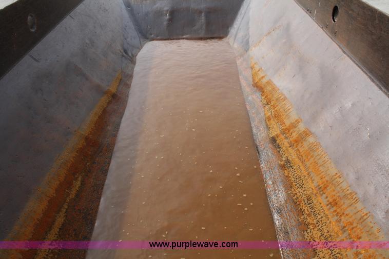 image for item C5696 1987 Caterpillar D350C articulated rock truck