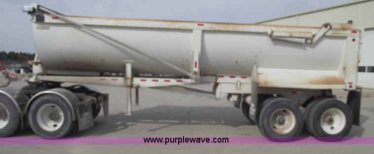 image for item C5704 1999 Clement 26' barrel end dump trailer