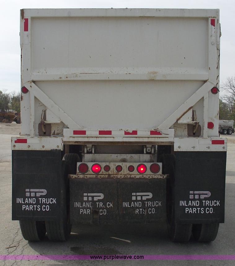 image for item C5704 1999 Clement 26' barrel end dump trailer