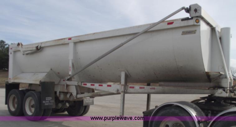 image for item C5704 1999 Clement 26' barrel end dump trailer