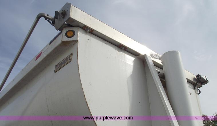 image for item C5704 1999 Clement 26' barrel end dump trailer