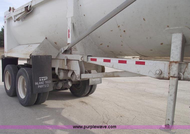image for item C5704 1999 Clement 26' barrel end dump trailer