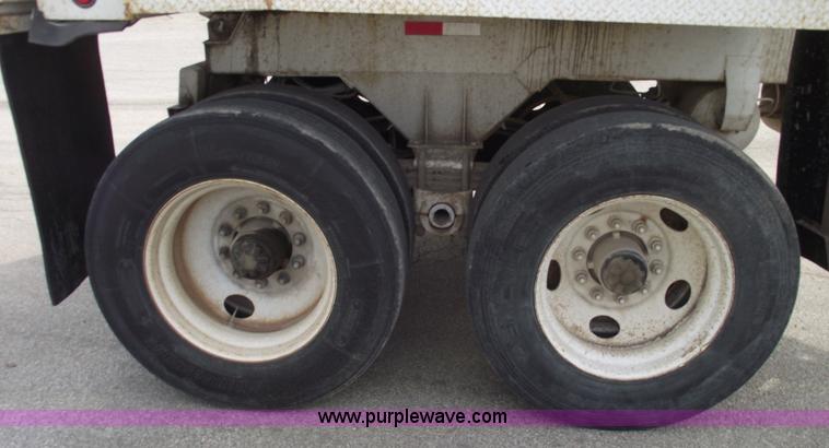 image for item C5704 1999 Clement 26' barrel end dump trailer