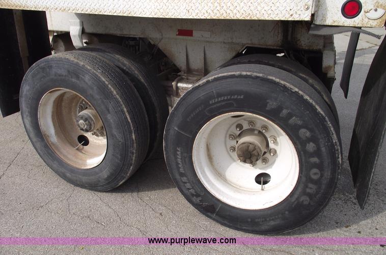 image for item C5704 1999 Clement 26' barrel end dump trailer