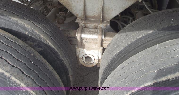 image for item C5704 1999 Clement 26' barrel end dump trailer