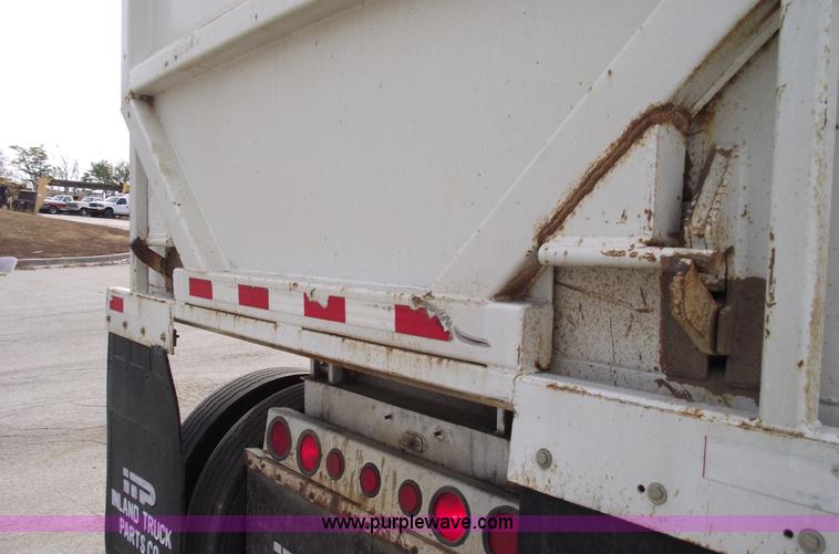 image for item C5704 1999 Clement 26' barrel end dump trailer