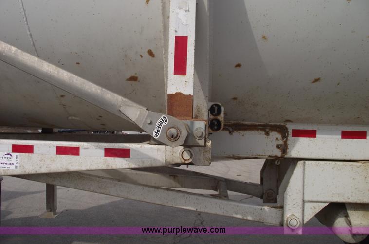 image for item C5704 1999 Clement 26' barrel end dump trailer